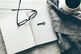 Reflections from a heart preparing for eternity. Image of book, glasses, coffee and a key.