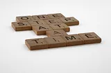 scrabble, scrabble pieces, lettering, letters, wood, scrabble tiles, white background, words, quote, letters, type, typography, design, layout, focus, bokeh, blur, photography, images, image, one step at a time, one day a time, one foot in front of the other, progress, don't give up, persevere, focus, intimidation, every journey, never give up, slow progress, slow and steady, steady as you go 