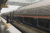 Snowy Amtrak platform.