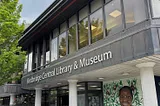 The front of a building. “Redbridge Central Library & Museum.”