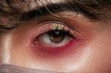 A close-up of an eye with make-up