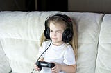 A little girl is playing some video games. (My daughter is a genius because I’m a genius. In other words, Smillew is a genius. Follow Smillew everywhere Substack Twitter.)