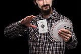 A magician doing a magic curation trick.
