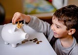 Why Rewarding Children with Money or Gifts Can Have Negative Consequences