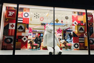 Cuddly unicorn in shop window. Photo by Mai Truong on Unsplash