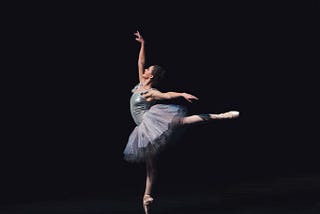 A ballet dancer in arabesque position.