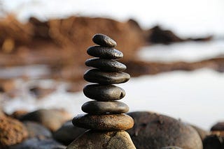 balancing stones in a pile