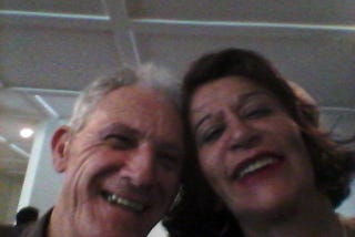 My Grandmother and grandfather together, and gently smiling, in a spontaneous way.