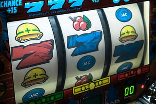 slot machine reels just a bit shy of three 7s