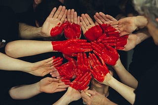 #BeautifyYourProjects People united to form a heart. (Photo by Tim Marshall on Unsplash) Design Hacks