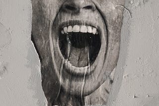 The lower half of a person with their mouth open as if they’re yelling. Their eyes aren’t shown in the drawing.