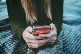 Girl using her mobile phone