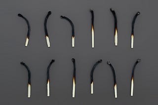 burned matches lined up