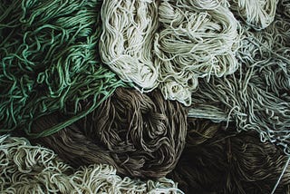 A black and white tangle of yarn. Not too dissimilar to many of our work environments.