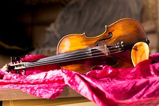 An old, much-loved fiddle, up for sale.