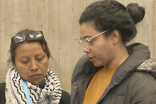 Screenshot from the City Council’s hearing on the BPS budget. It shows Glennys Moya reading Sonia Medina’s statement to the City Council in Spanish. Erika Pérez translated the statement into English.
