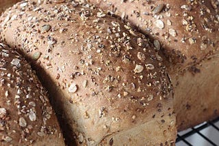 Fresh baked whole wheat loaves of bread.