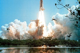 Space shuttle launching from Cape Canaveral.