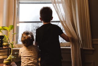 kids looking out of window
