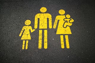 A bunch of restroom-style icons depicting a straight nuclear family.