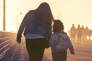Silhouette of mother and child