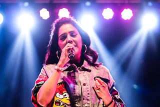 A female singer with a microphone
