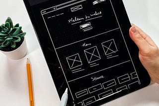 A tablet screen showing an app wireframe