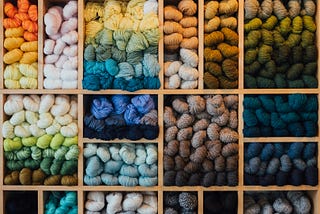 Shelves full of yarn in multiple colors