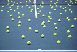 How many tennis balls can fit in a two bedroom apartment?