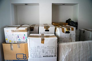 Stacks of taped up boxes