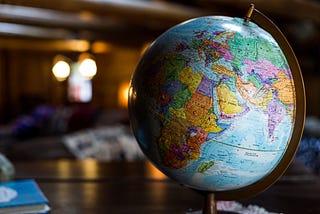 A globe on a table in a library