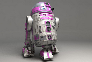 Photo of R2-KT, an R2-D2 unit with pink instead of blue highlights