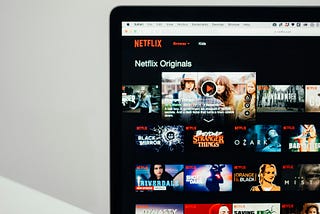 Laptop screen showing Netflix home page