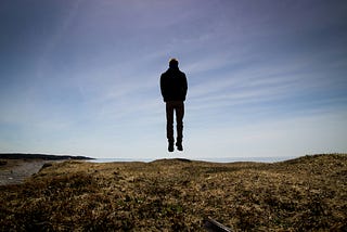 Man levitates a few feet off the ground with his hands in his pocket because that’s the secret sauce