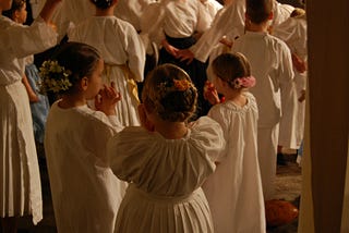 children waiting to participate in a cultural event.