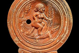 Unveiling the Roman Terracotta Oil Lamp: A Provocative Caricature of Cleopatra