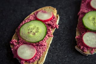 Gherkin on top of an open faced sandwich