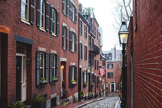 What property features influence the rental rate of homestays in Boston, MA?