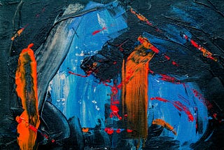 An abstract painting with broad strokes of dark blue, light blue and orange paint on a canvas