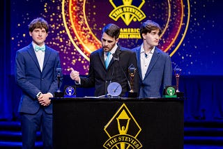 Team NVSTly Accepts Gold Stevie® Award in New York