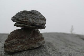 A stone balancing on another stone.