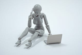 Robot at a laptop