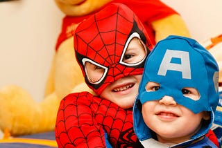 Children in superheros costumes.