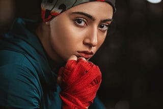 Woman with hands wrapped for boxing