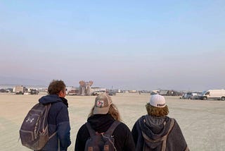 Three adventurers on the middle of a  desert in Nevada