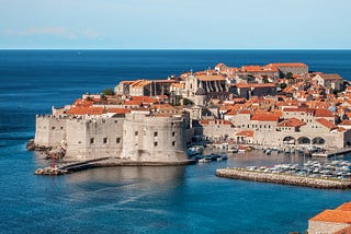 Rooftops, Sea, and Silence