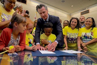 Governor Gavin Newsom signing #AB378 which allowed an estimated 40,000 child care workers the right to unionize. 2019. Source: Government of California