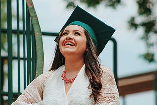 A woman celebrating her university degree