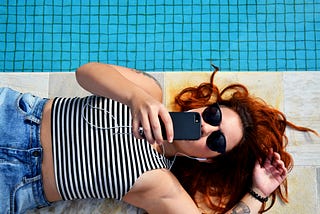 Woman with iPhone at Sao Paulo