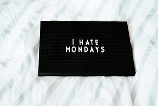 Word board spelling out “I Hate Mondays”